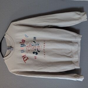 Disneyland's cream sweatshirt